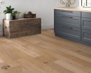 Dark kitchen with a oak engineered wood floor